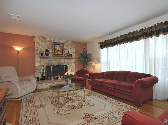 LIVING ROOM ADJACENT TO FORMAL DINING ROOM
