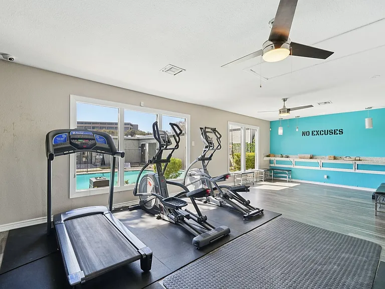 Elevate your lifestyle at The Riley Apartments with our state-of-the-art fitness center featuring top-tier equipment and bright, inviting spaces. Get ready to achieve your fitness goals. Schedule a visit today!