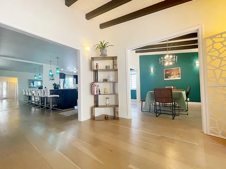Open concept kitchen equipped with all new stainless steel appliances, breakfast nook, Living room & Family room