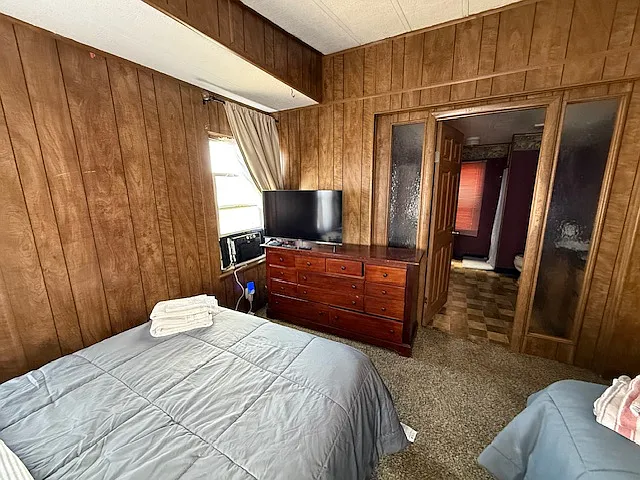 Master bedroom leading to Master bathroom. Air conditioner in every bedroom.