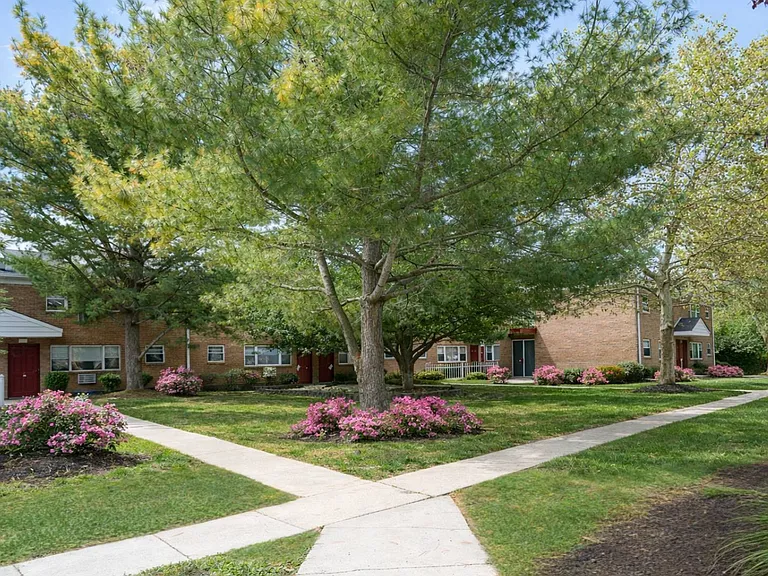 Welcome to Toms River Apartments, where lush greenery and vibrant flower beds create a serene oasis. Enjoy spacious living with convenient amenities just steps away. Don't miss out on your new homeschedule a visit today!