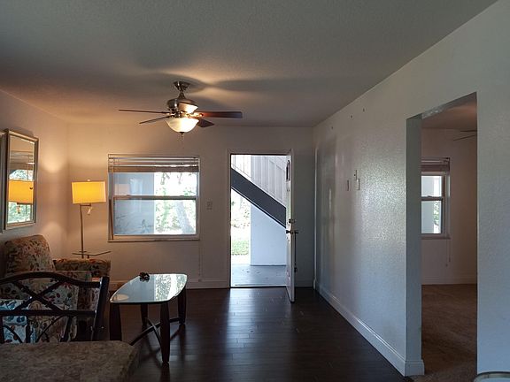 Living room. Front entrance. Bedroom.