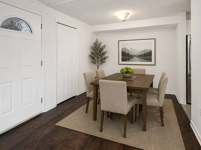 Modern dining room with natural accents - Staged