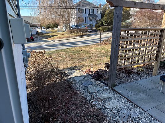 Brand new bluestone patio with privacy fence.