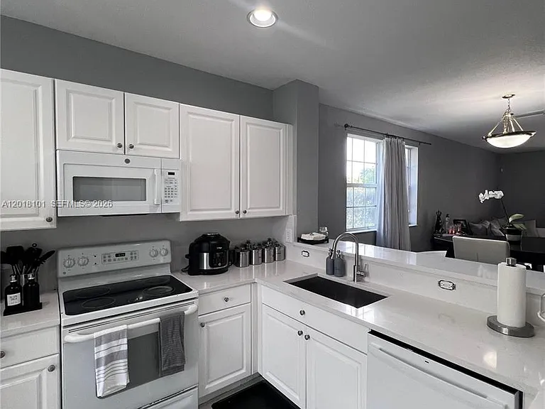 681 NW 42nd Ave #- — Photo 3
