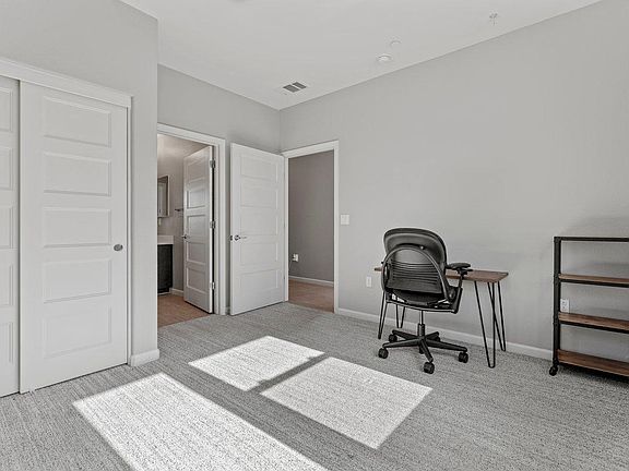 Bedroom/office #1 on the ground floor with private bathroom and closet