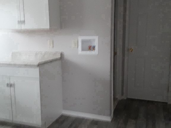 bathroom behind kitchen
