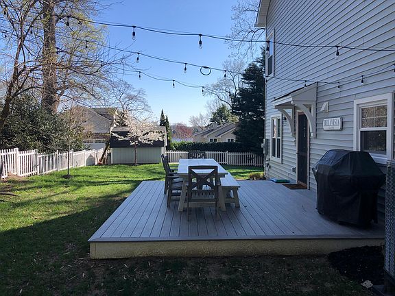 Rear Deck w/ Cafe Lights and 10' Dining Table (to Convey with Rental)