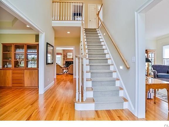 Dramatic two story entry filled with wonderful natural light.