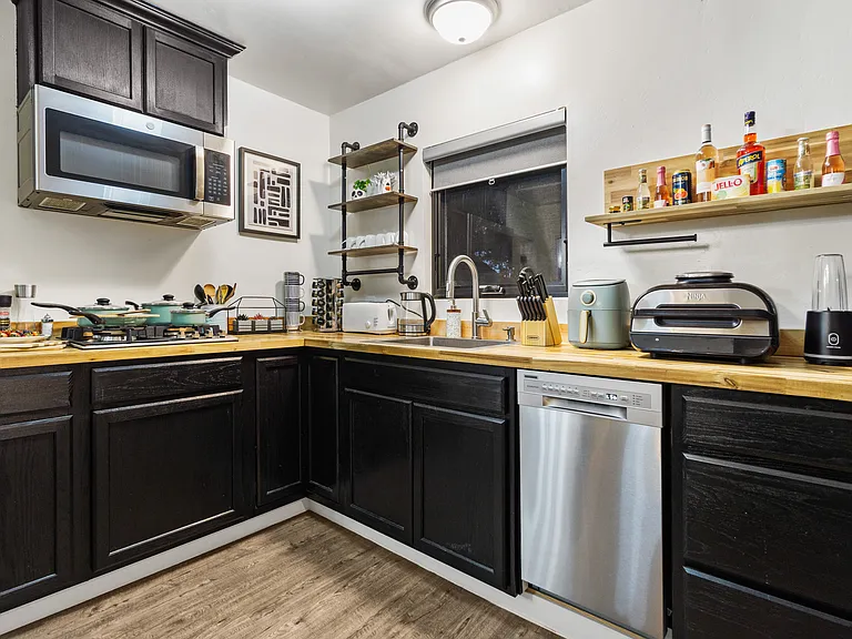 Compact charm! Our kitchenette is equipped for all your cooking needs!
