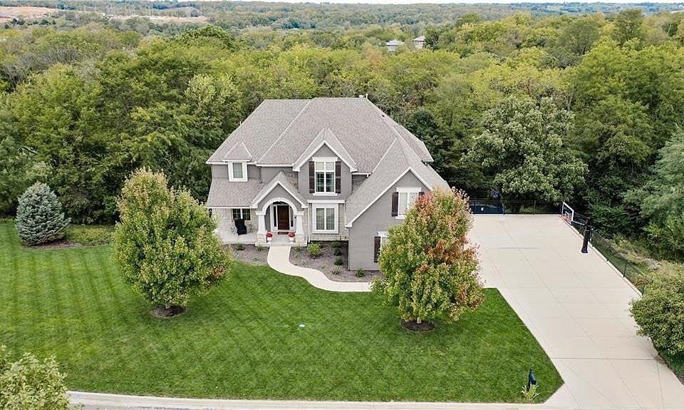Private lot spanning over 1/2 acre in gated community.