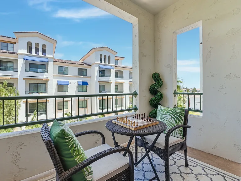 Private balcony with partial lake views.