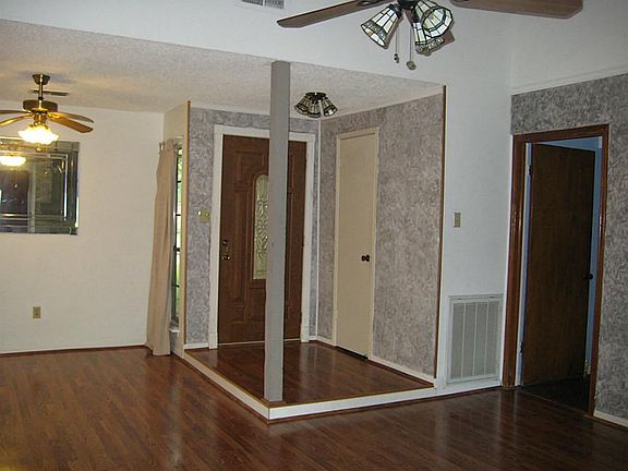 Looking back toward the front door, notice the raised foyer. The dining room is to the left. You'll 