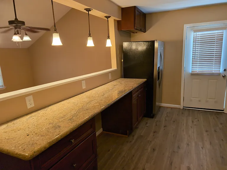 Kitchen bar overlooking Living room