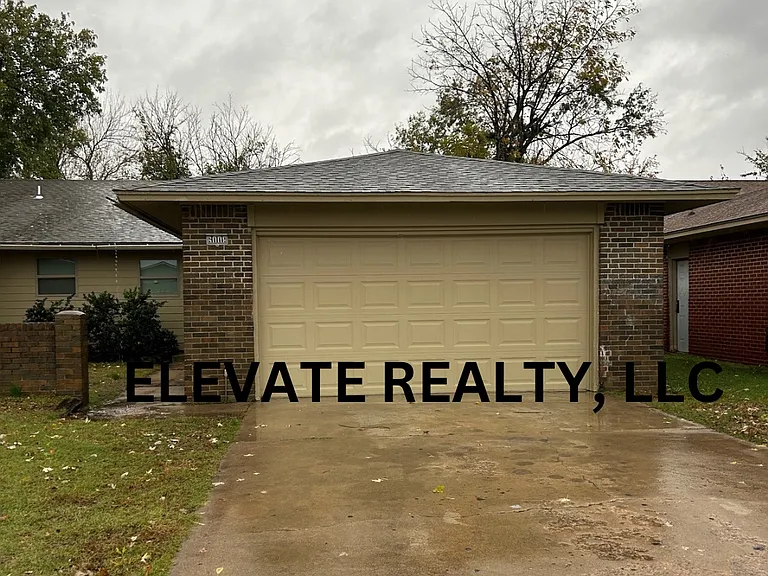 6008 S Madison Pl — Photo 1
