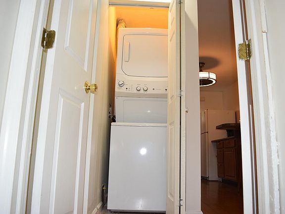Stacked washer and dryer on main level