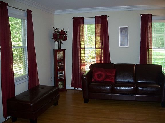 Living room with nice windows. Double doors lead to Great room. 