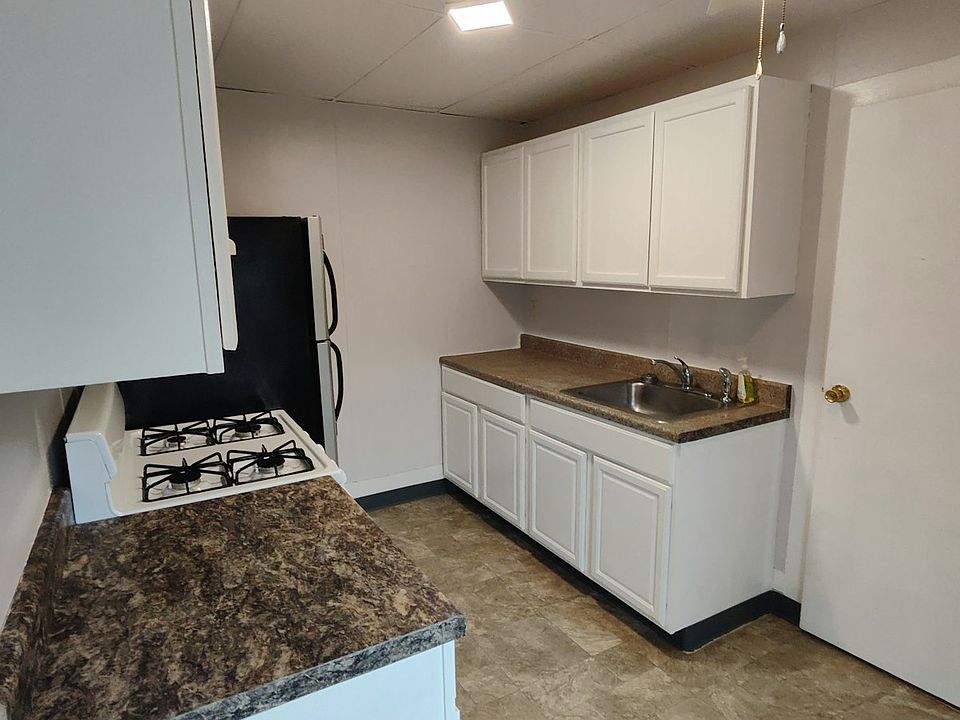 New oven, ceiling tiles, painted walls