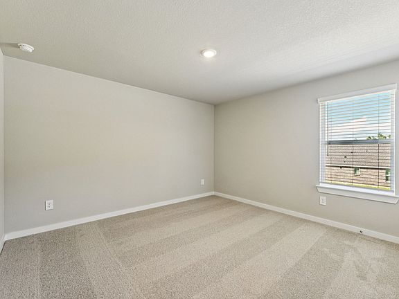 The Ian floorplan in Stewart apos s Ranch of Conroe, TX.