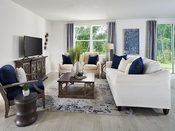 Family Room of the Foxglove Plan modeled at Spring Hill.