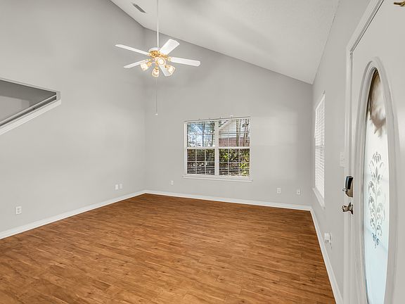 Living room with vaulted ceilings