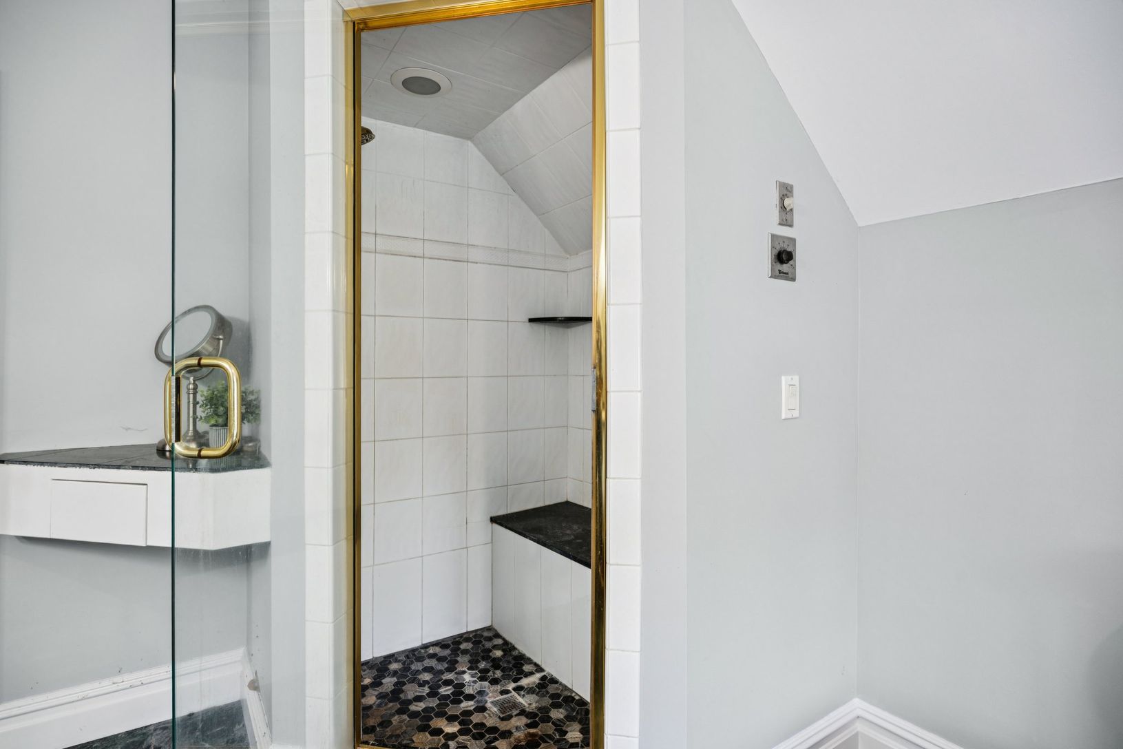 Primary Bath featuring an e-steam shower designed for ultimate relaxation.