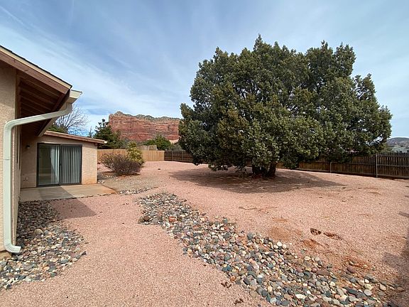 Backyard view towards Courthouse Butte Formations, house to the left
