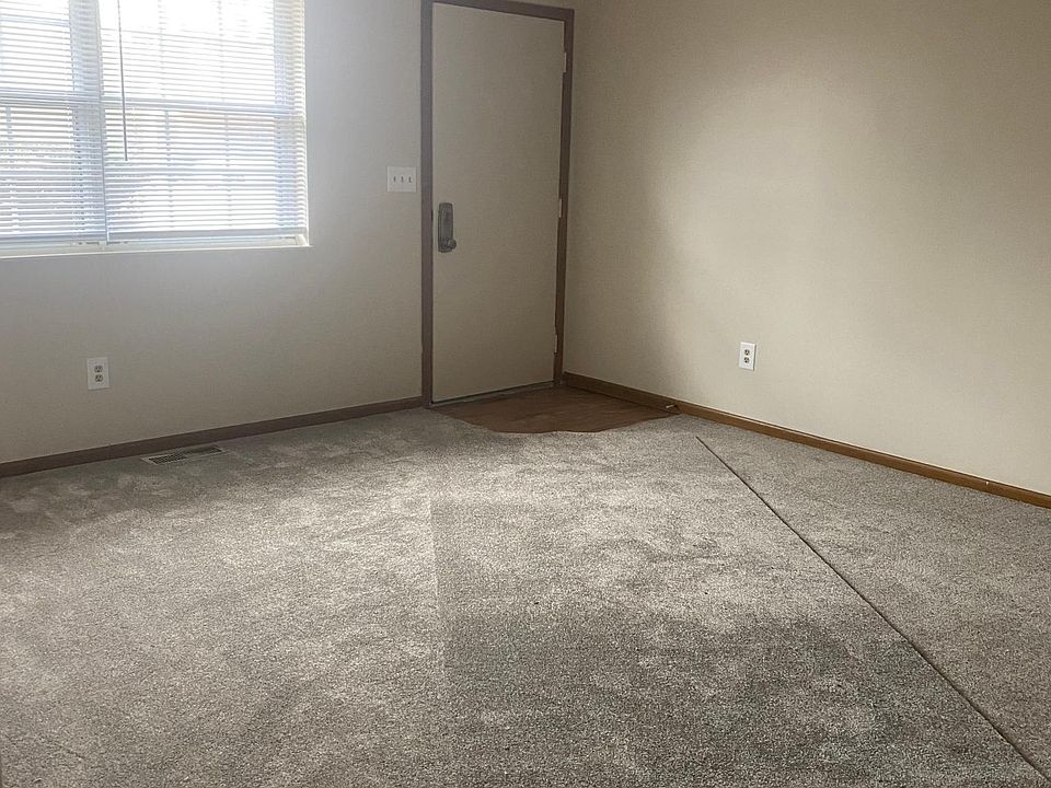 living room with newer carpet
