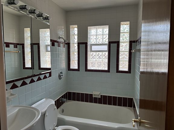 Bathroom - and there's a closet behind the door