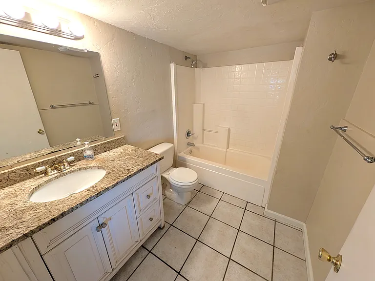 One of two full bathrooms