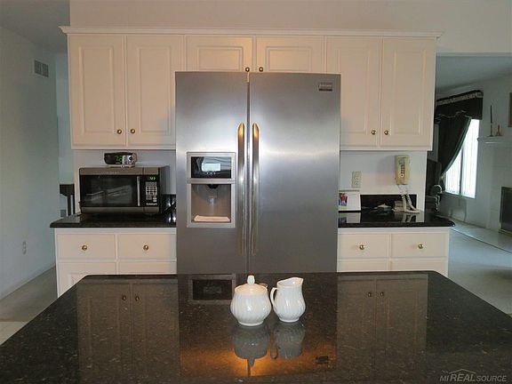 Stainless Refrigerator, Dishwasher, Stove, Washer, and Dryer