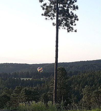 Hot air balloons travel by