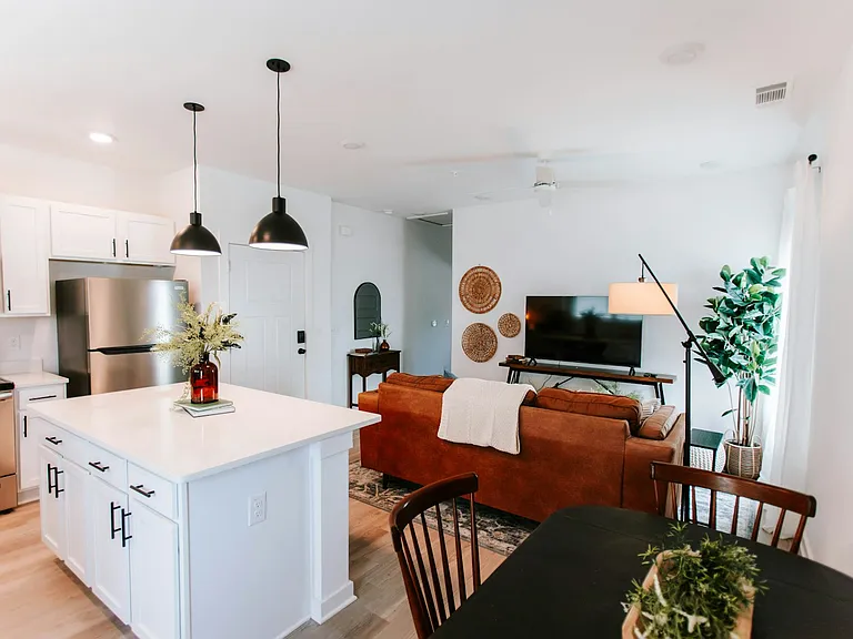 Stay connected, stay comfy. Our open kitchen flows right into the living space, making it perfect for cooking, chatting, or lounging with friends and family.