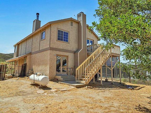 Rear with outside stairs