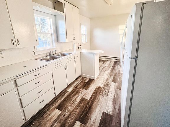 Clean, fresh paint, and new flooring throughout!