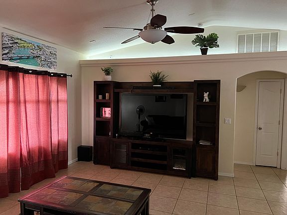 3 D TV in Living room and pull out couch