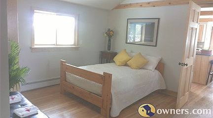 Master Bdrm. 13.5' x 15', sitting area, walk-in closet, walk out