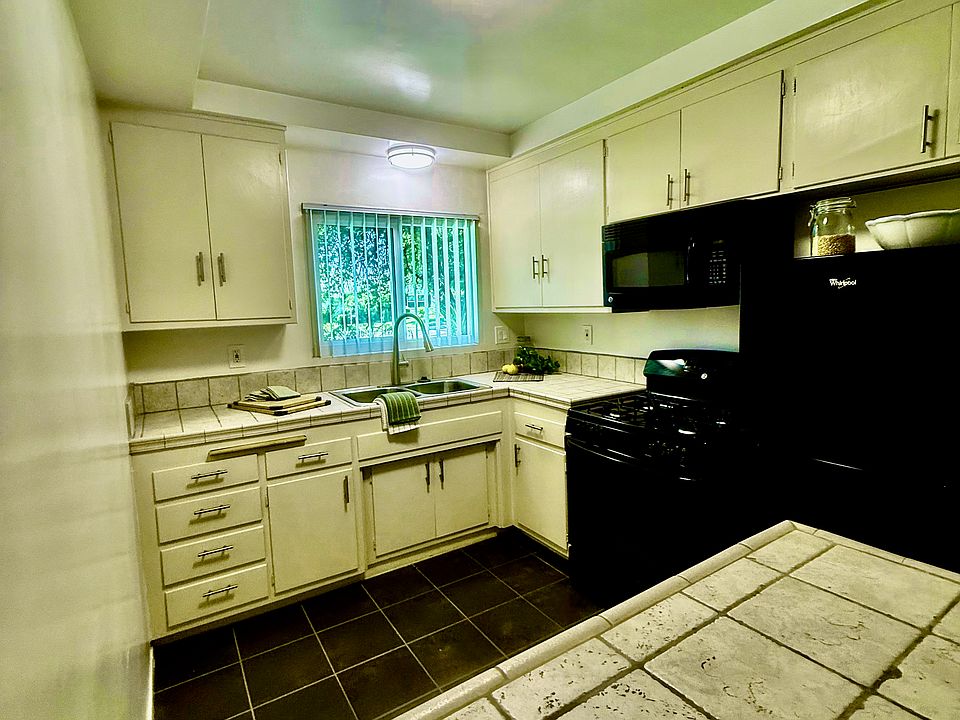 Large Kitchen with Imported Italian tiles and new appliances.