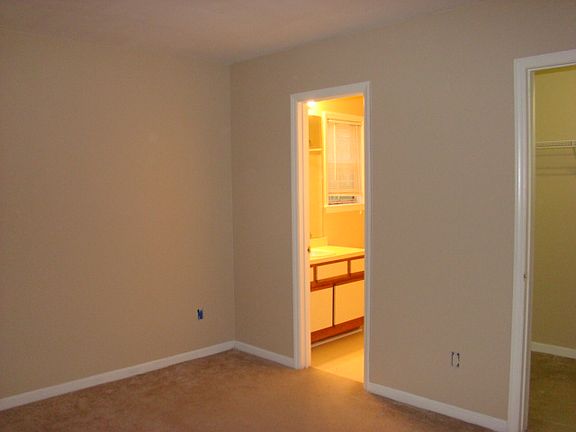 Bedroom with walk-in closet