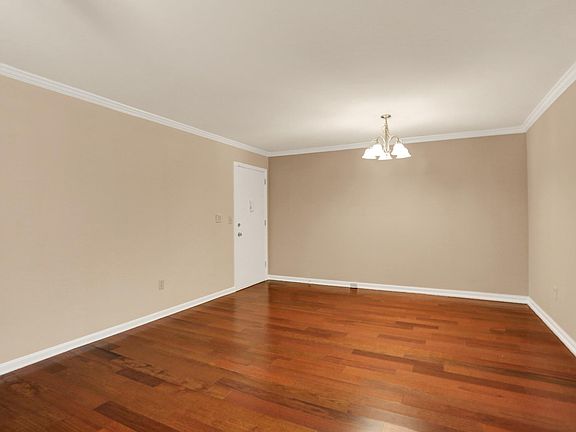 Modern Unit living room/dining room. Wood flooring may be available in some contemporary units.