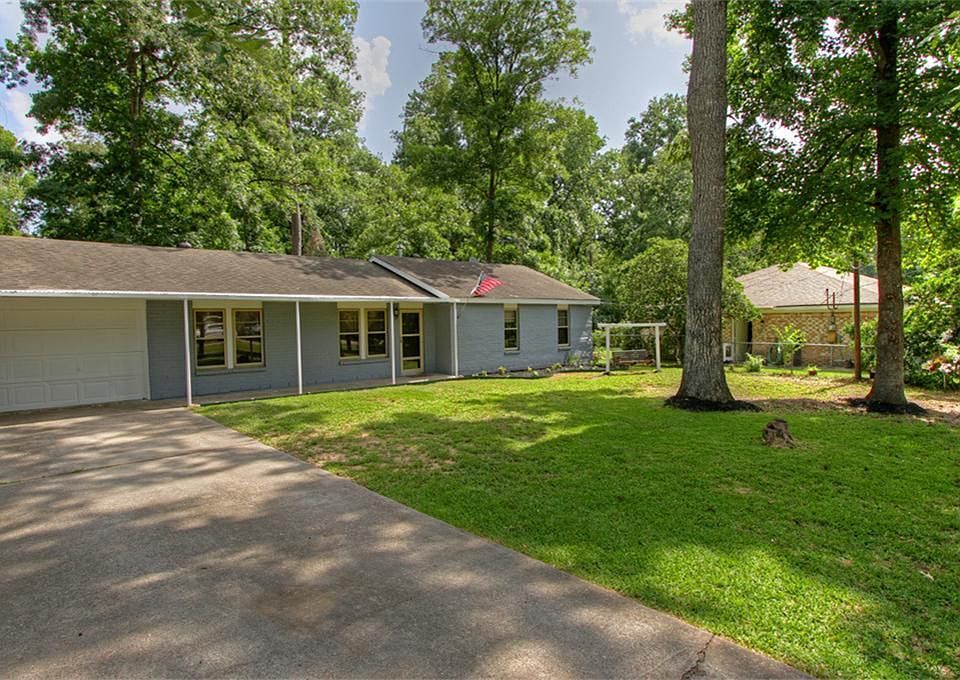 Large front yard with covered front porch