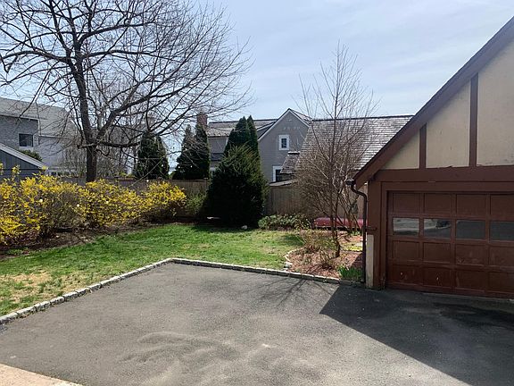 Two-car garage with electric opener and additional off-street parking