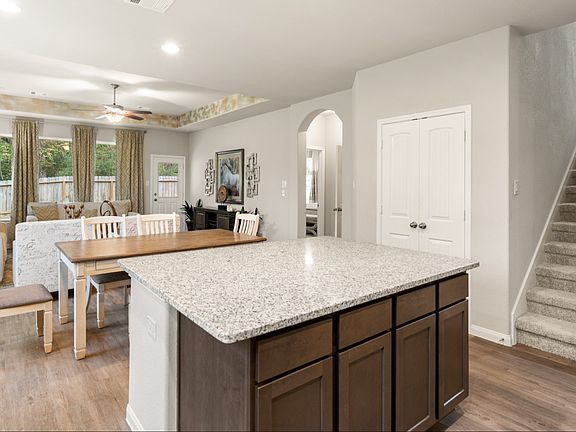 Kitchen to Dining Area and Family Room