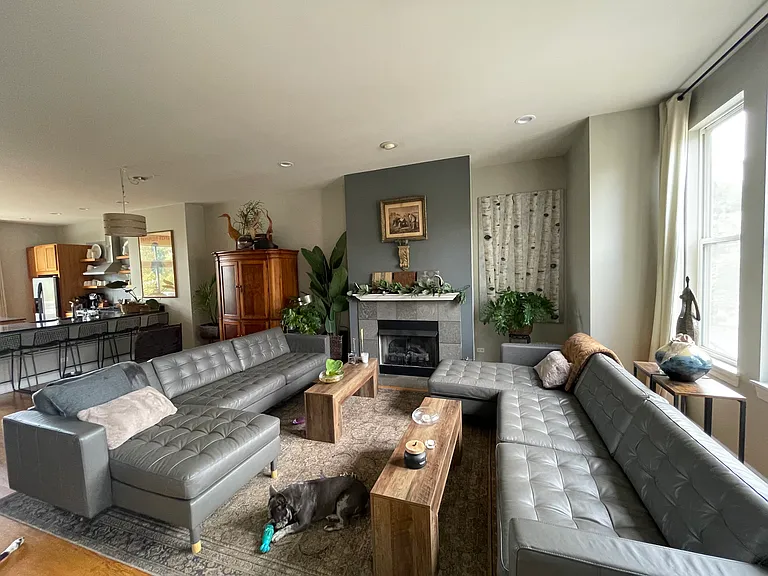 Living room with gas fireplace and lots of seating