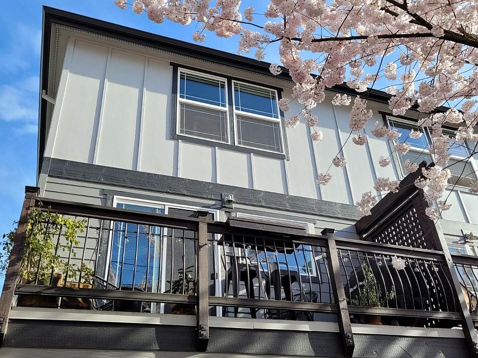 Balcony facing the park (first floor window is of separate unit). Year round herb plants and sufficient sunshine for tomatoes in the Summer.