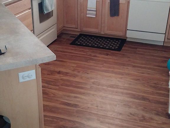 New luxury vinyl flooring throughout first floor for easy cl