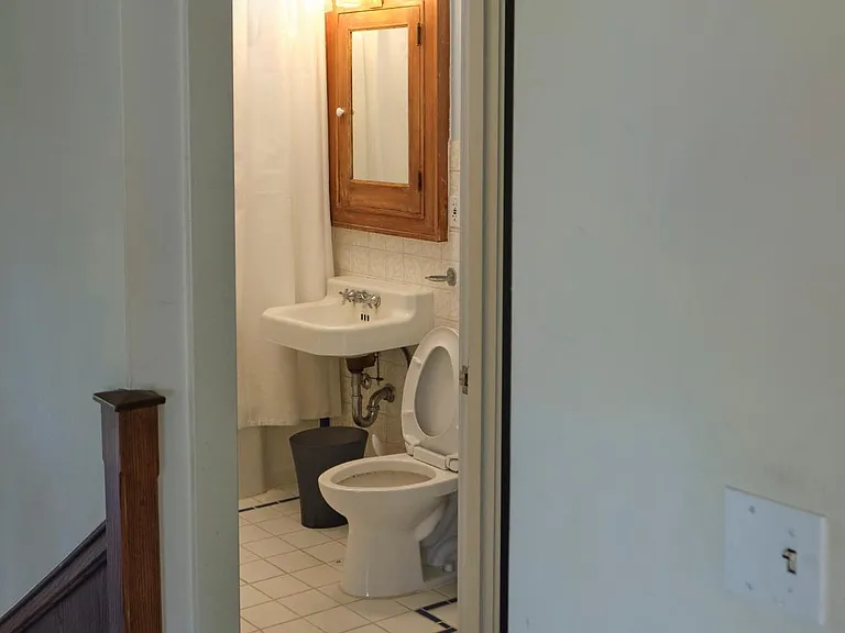 The toilet as seen from the common area.