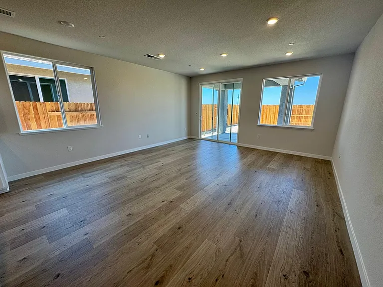 Great room leading to porch and backyard