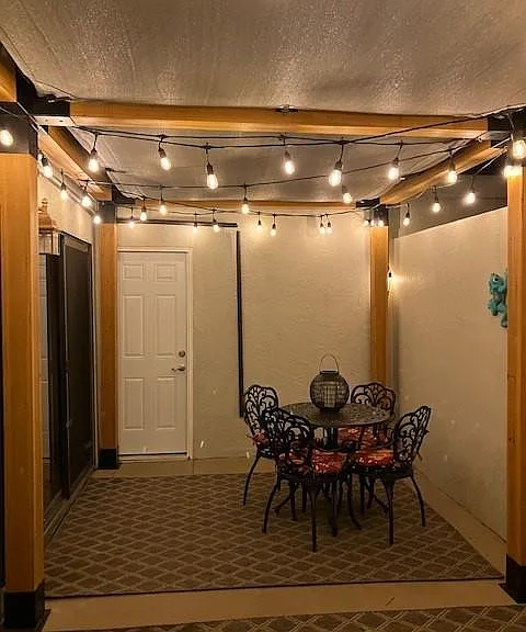 Outdoor twinkle lights under the pergola
