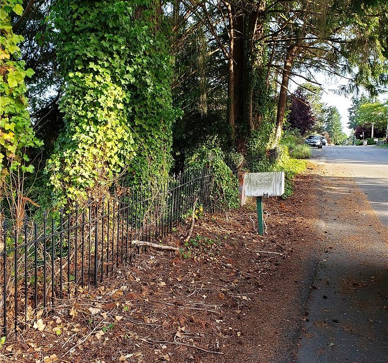 Original mailbox on street level at top of property